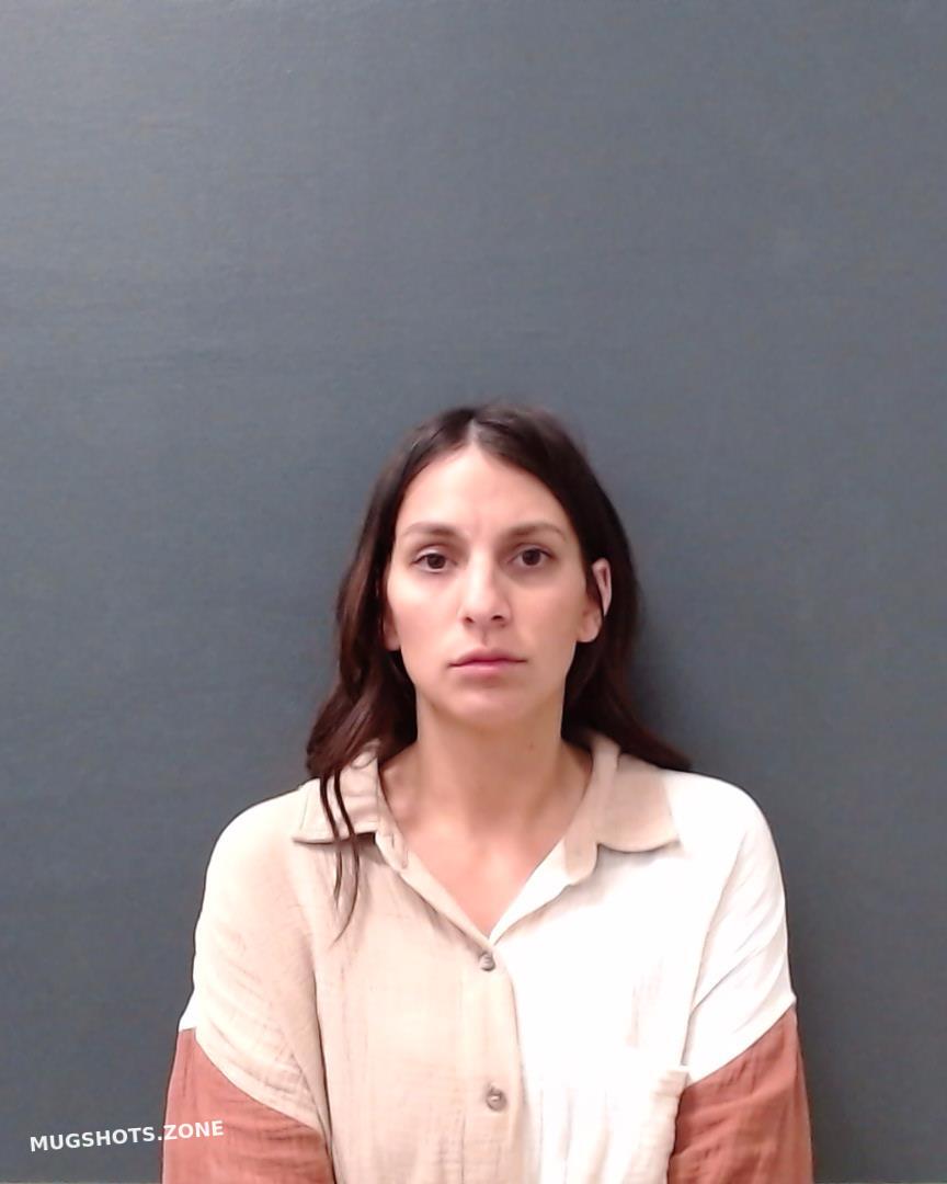 Hailey Shea with a mischievous grin her secrets waiting to be unveiled