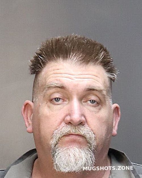 Andrews, Texas Mugshot Spotlight: The City’s High-Profile Arrest Caught in Framed Newspaper Snapshot